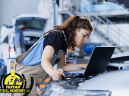 Expert follows car checklist on laptop