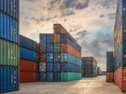 perspective view of containers at containers yard with forklift